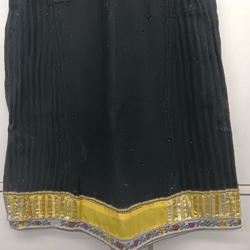 Collectible traditional wool dress used with yellow border