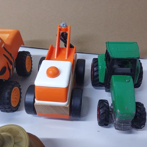 Children's toy set with submarine, cars, tractor, and magic lamp