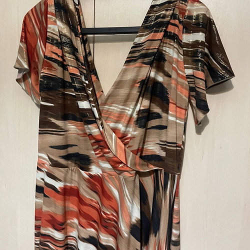 Dress new with beautiful elastic design, size L/XL