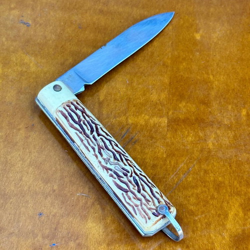 Vintage Tramontina folding knife from Brazil, used, decorative handle