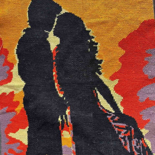 Handmade embroidery used, couple silhouette with sunset