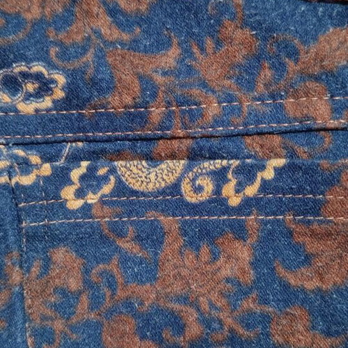 Vintage flare pants with oriental dragon pattern, blue and brown