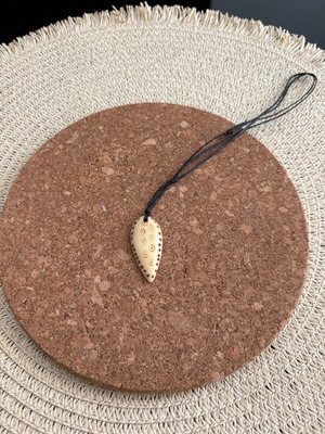 Carved bone pendant handmade new, beige