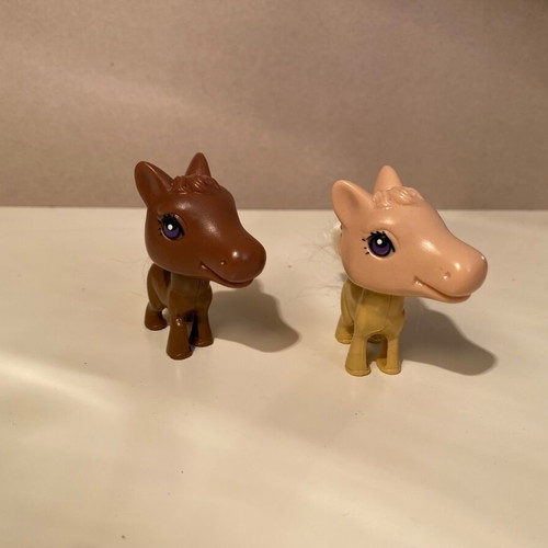 Set of small plastic pony figures like new