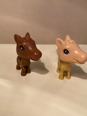 Set of small plastic pony figures like new