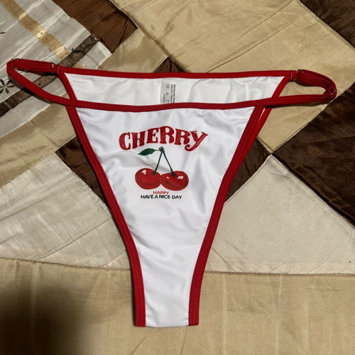 Swimsuit new with playful design, size Large, white and red