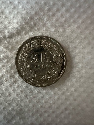 Half franc coin 2009 used