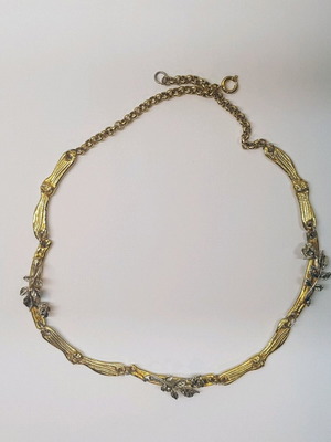 Necklace with embossed roses in gold and silver tones