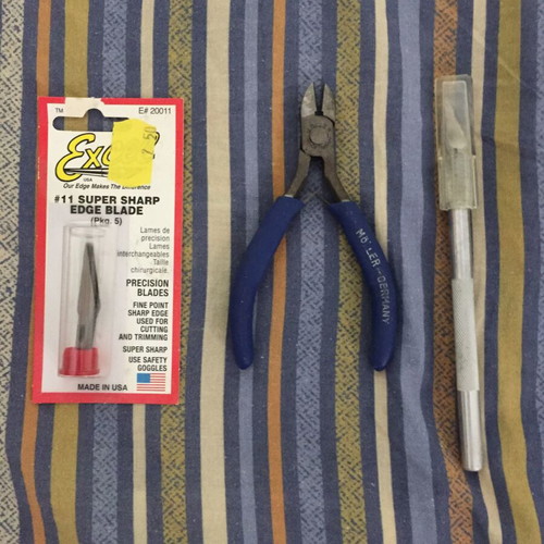 Modeling knife and pliers used with spare parts