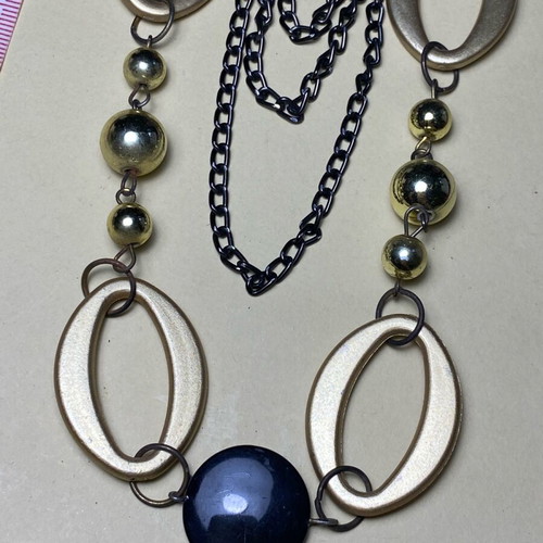 Quadruple necklace like new with three chain rows and beads