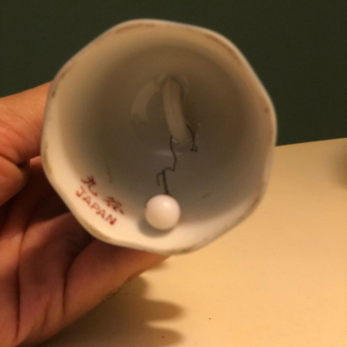 Porcelain bell with hand-painted design like new
