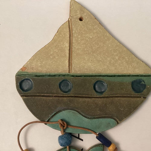 Ceramic hanging boat with fish wall decor