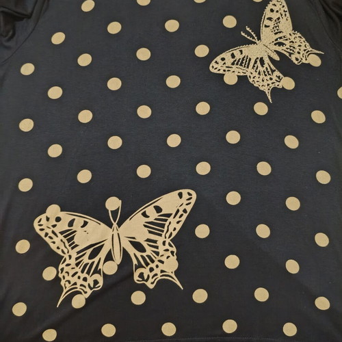 Black oversized t-shirt with gold/beige polka dots and butterflies like new