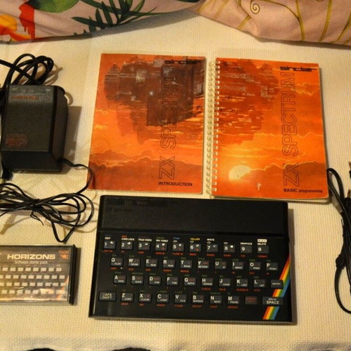 Sinclair ZX Spectrum 48K console used with accessories and manuals