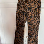Zebra flare leggings used, brown, size S