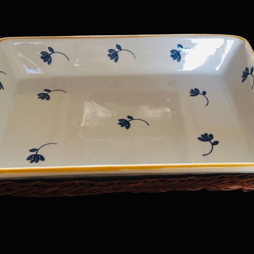Rectangular Pyrex used with blue flowers and wicker base