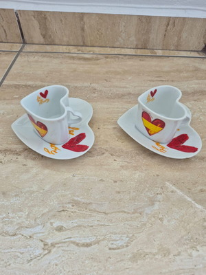 Heart-shaped cups with saucers set of 2, like new