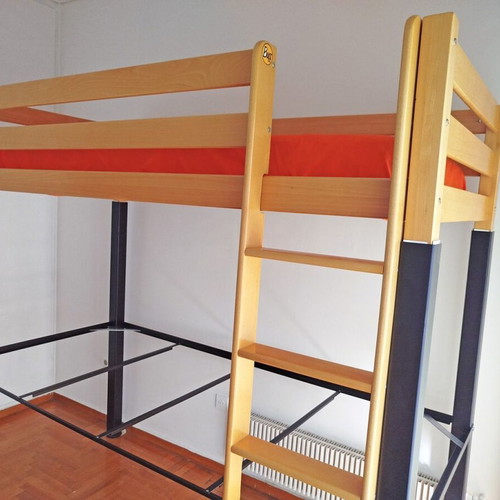 Wooden loft bed like new with metal frame and desk