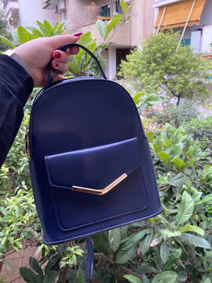 Blue backpack bag like new with gold details
