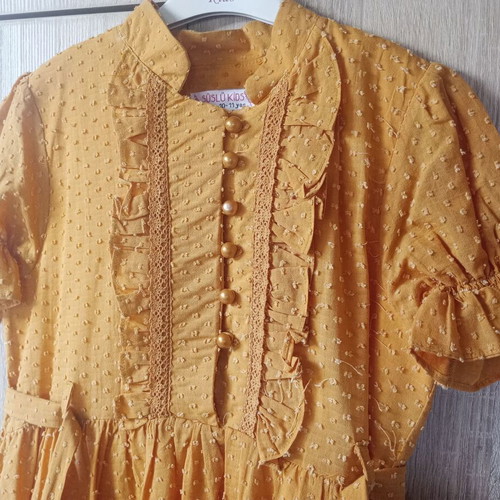 Girls' dress like new, 10 years old, with romantic ruffles