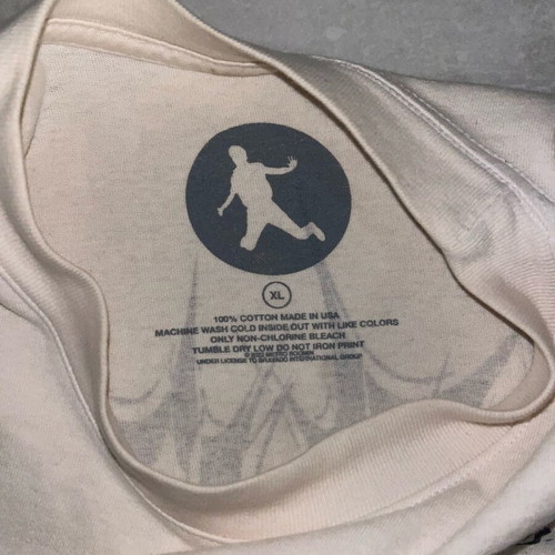 T-shirt cream from Heroes and Villains merch like new