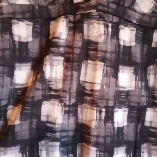 Women's blouse like new with unique design, size XL, black and white