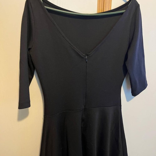 Innocent medium dress in like new condition with lace trim