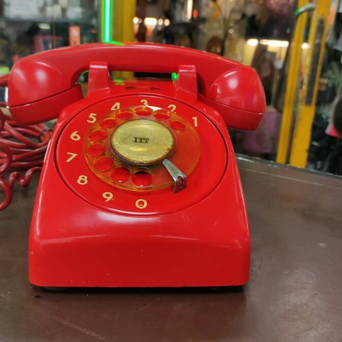 ITT telephone used, red, wired