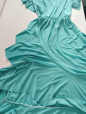 Women's asymmetrical dress like new with pleated skirt and ruffles