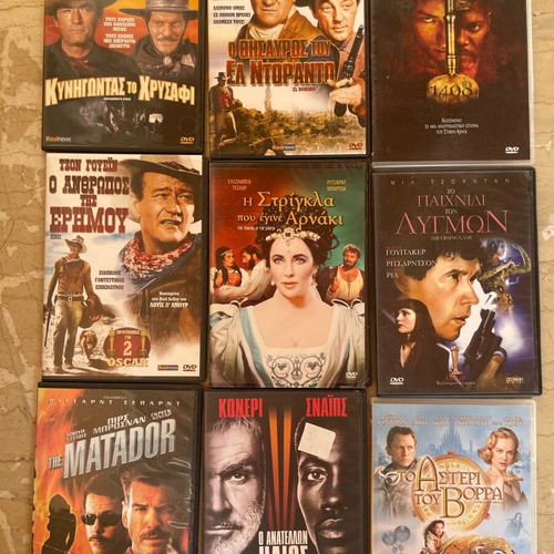40 DVD movies in slim cases