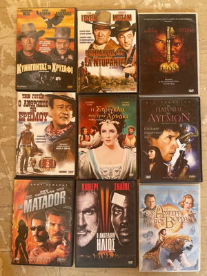40 DVD movies in slim cases