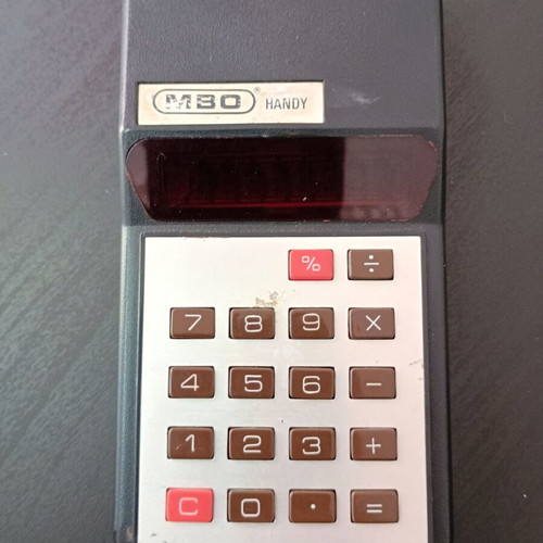 MBO Handy calculator collectible with handmade leather case