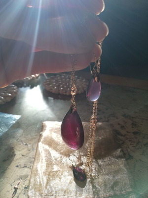 Elegant gold jewelry set with drop-shaped amethyst crystals, like new