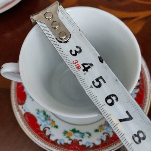 Set of 4 cups with saucers like new