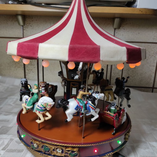 Mr Christmas carousel used with music and lights