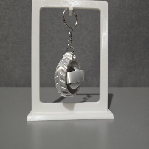 3D printed rotating wheel hub keychain like new