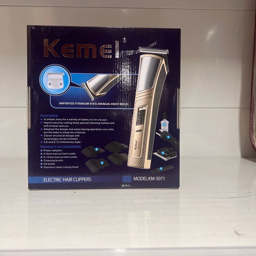 Kemei KM-5071 rechargeable hair clipper new, gold color