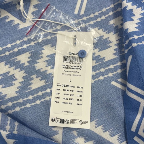 Beach dress new, blue with nice pattern, size L
