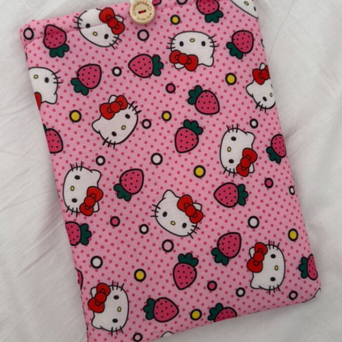 Handmade booksleeve with soft lining and button closure