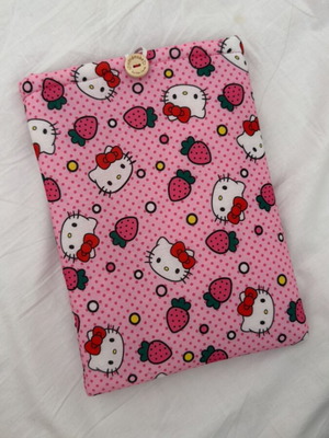 Handmade booksleeve with soft lining and button closure