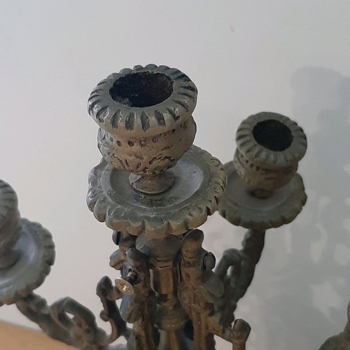 Bronze candlesticks used, pair with patina and carved base