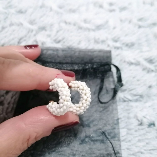 Earrings with white beads used