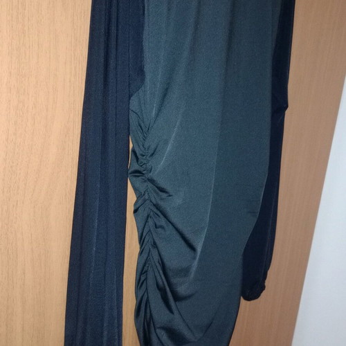 Black fitted dress with ruching and transparent sleeves like new