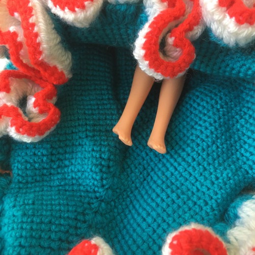 Spaniola doll with knitted dress and movable upper limbs