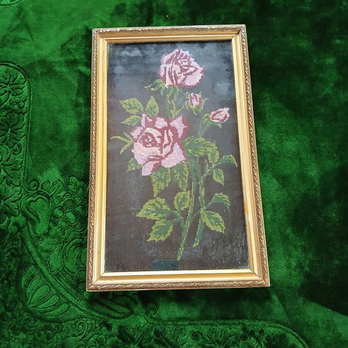 Framed embroidery with pink roses