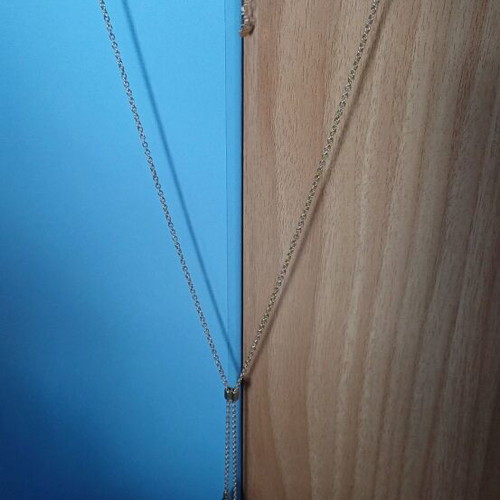 Necklace and earrings set new with white pearls in gold color