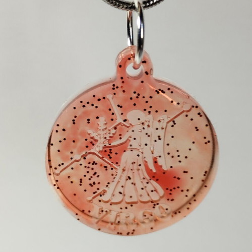 Handmade pendant with zodiac sign Gemini or Scorpio in red pigment