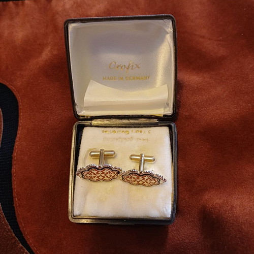 Orofix cufflinks used, vintage, embossed gold on coral background