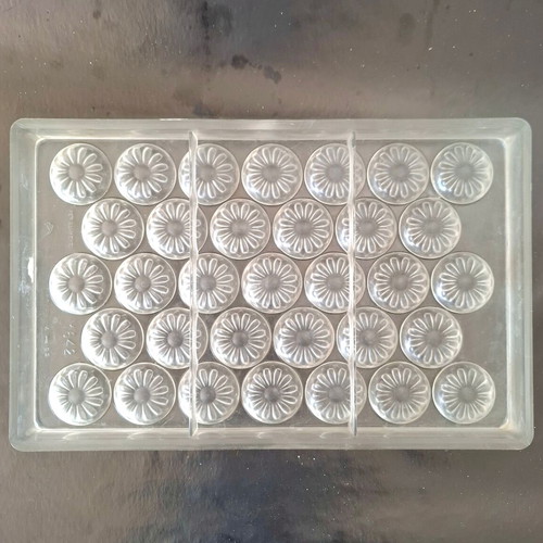 Polycarbonate chocolate mold used, 33 cavities, flower daisy design