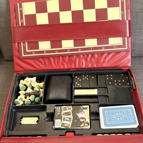 Vintage board games set used with chess, checkers, dominoes and cards